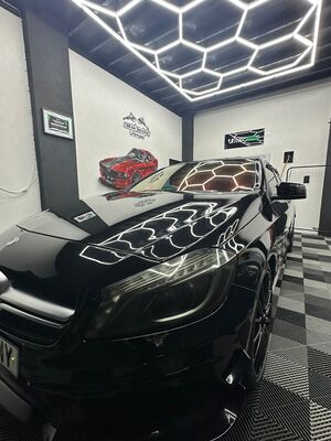 Glossy paint correction finish on a black Mercedes-Benz A-Class in our detailing bay
