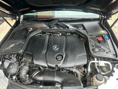 Thoroughly cleaned and dressed engine bay of a Mercedes-Benz