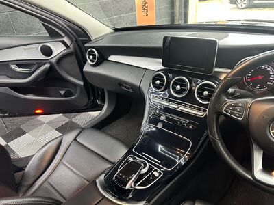 Detailed Mercedes-Benz dashboard and center console showing deep cleaned interior surfaces