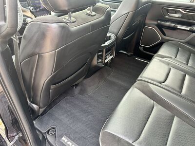 Fully vacuumed and detailed rear cabin footwell of a RAM pickup truck